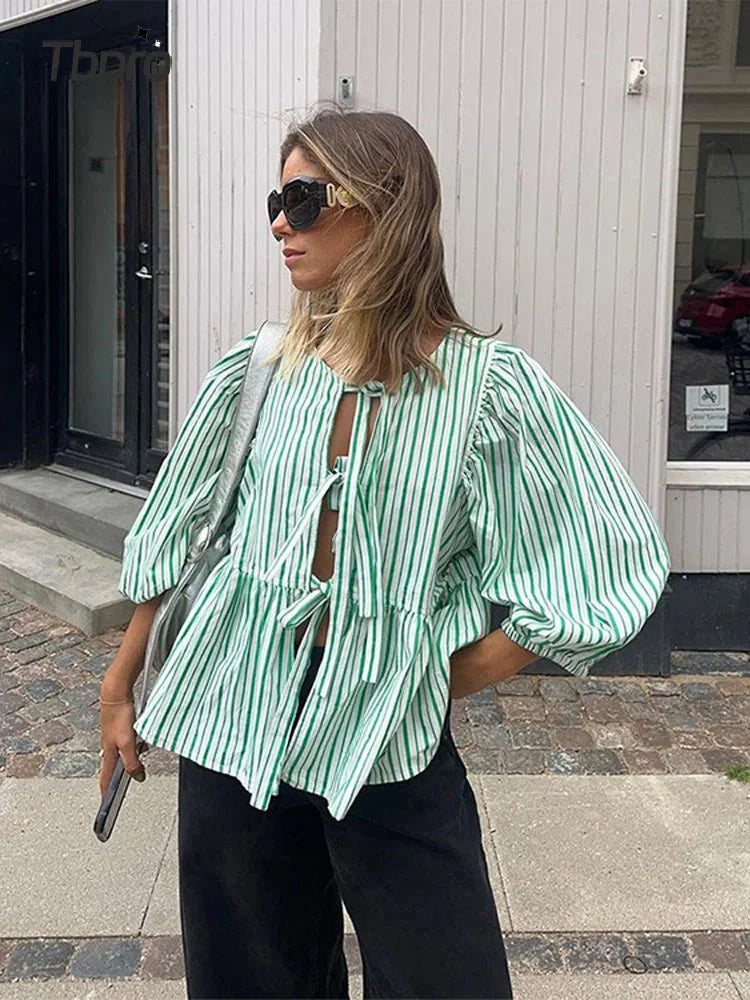 Jemima | Elegante blouse met pofmouwen en strikhals