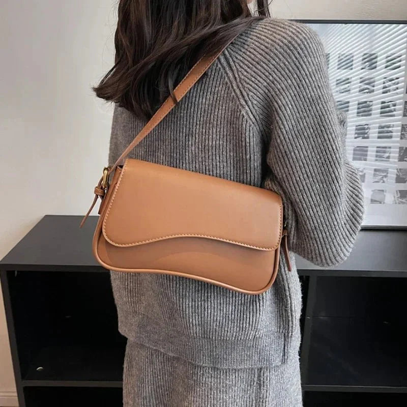 Juneesa | Crossbodytas met klep