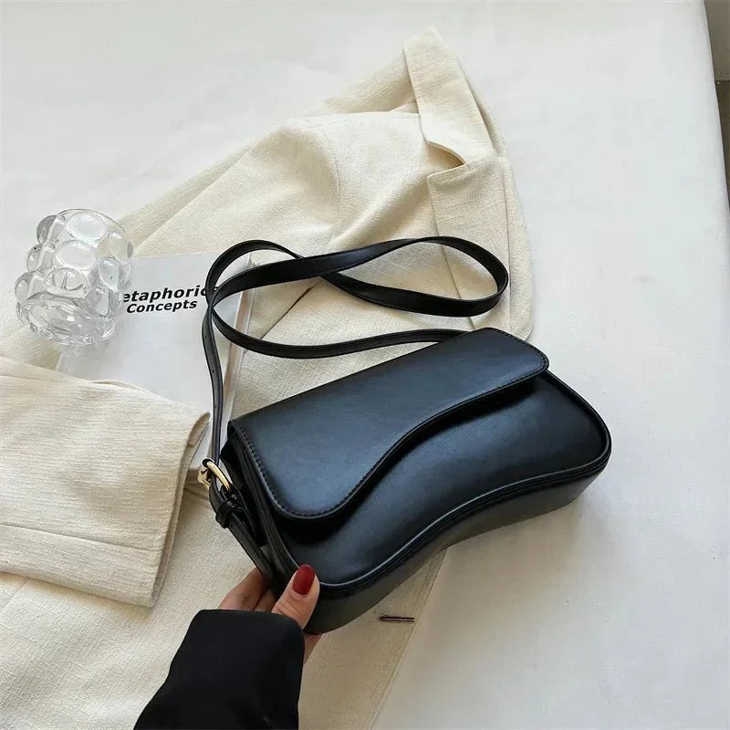 Juneesa | Crossbodytas met klep