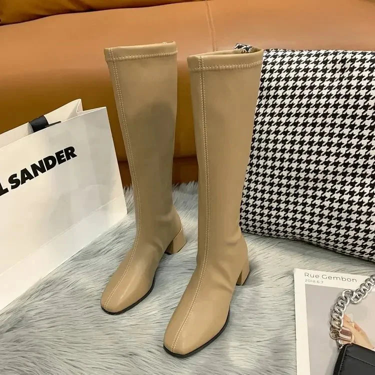 Anvella | Kniehoge laarzen met blokhak