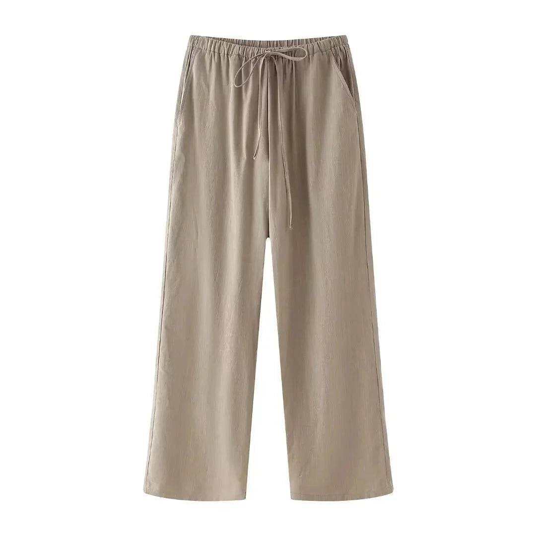 Jorella | Verfijnde wikkeltop en broekset