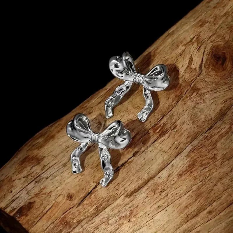 Sorentha | Kleine oorbellen met strikje