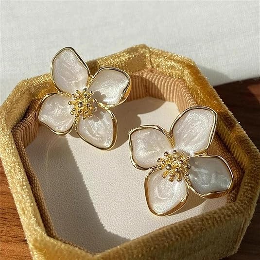 Novelle | Charmante oorbellen met geglazuurde flora