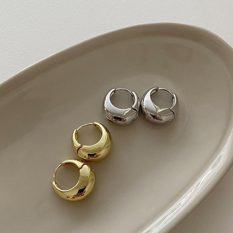 Zaniva | Opvallende maanvormige oorringen