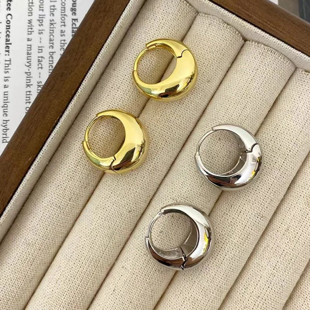 Zaniva | Opvallende maanvormige oorringen